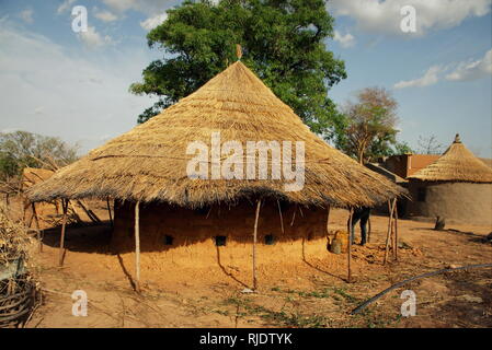 traditional style building on a farm in Ghana used for storage of onions Stock Photo