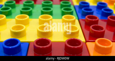 Plastic building blocks of some different colors Stock Photo