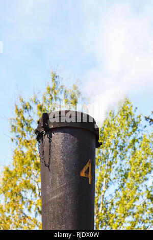 Chimney on an old steam locomotive Stock Photo