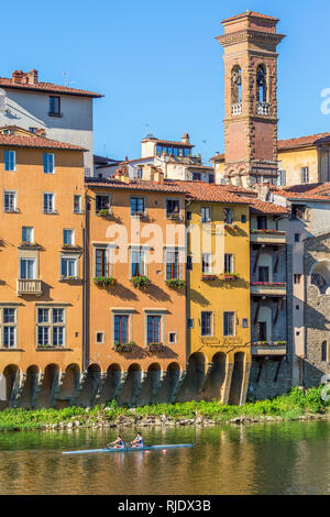 Apartment building located on the river with a rowing boat Stock Photo