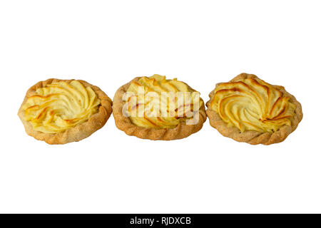 three cheesecakes with potatoes, white background. Traditional russian baking Stock Photo