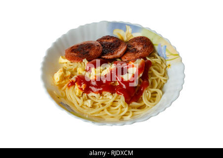 spaghetti with sausage in a plate on a white background. Stock Photo