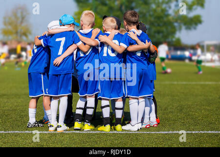 Kids Sport Team Gathering Children Play Sports Boys In Sportswear Jersey  Uniforms Having Shout Team Youth Sports For Children Youth Football Academy  Background With Copy Space Stock Photo - Download Image Now 