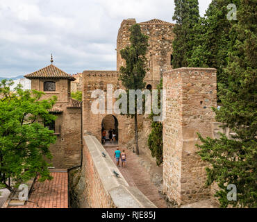 People walking wthiin the walls of fortified palace, Alcazaba, Malaga, Andalusia, Spain Stock Photo