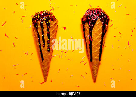 Two tasty delicious ice creams with chocolate topping Stock Photo