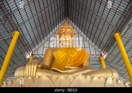 giant golden buddha statue in public buddhist temple Stock Photo