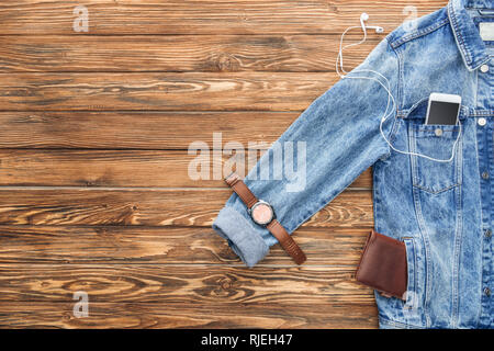 Top view of male accessories and gadgets on the wooden table Stock Photo -  Alamy