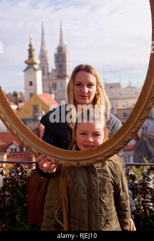 Small girl enjoys the Christmas faire - Advent in Zagreb, Croatia Stock Photo