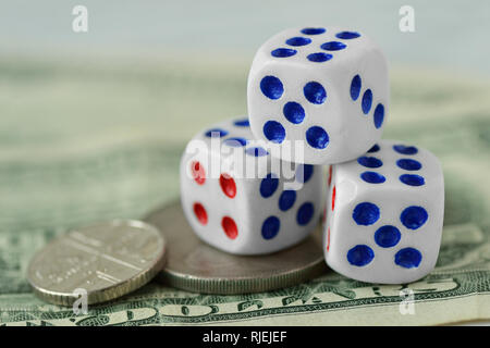 Dices on dollar money background - Concept of risky investments and gamble Stock Photo