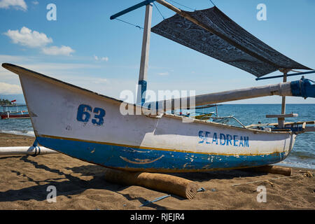 Traditional fishing boats on Lovina beach in North Bali Stock Photo