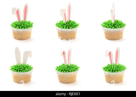 Easter bunny ears cupcakes shot from different angles. Isolated on white. Stock Photo