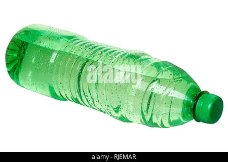 Green bottle of water with drops lies horizontally, Studio lights, isolated on white background Stock Photo