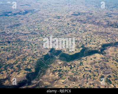 Aerial view of river valley flowing through farmland in Ethiopia, Stock Photo