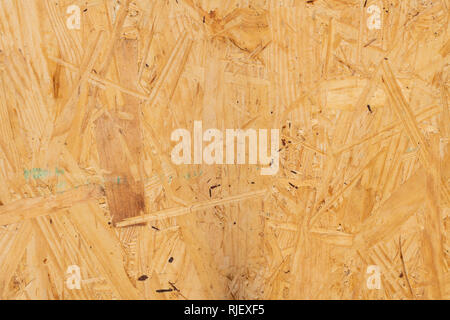 Sub flooring board made of wood chips background. Stock Photo