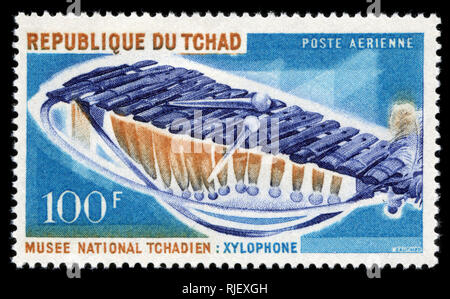 Postmarked stamp from Chad in the Musical instruments series issued in ...