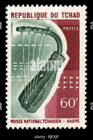 Postmarked stamp from Chad in the Musical instruments series issued in ...
