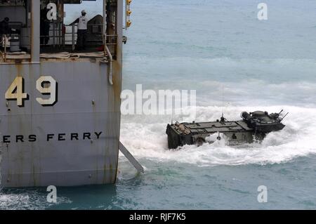 Amphibious vehicle leaves USS Harpers Ferry. (5609975653). Stock Photo