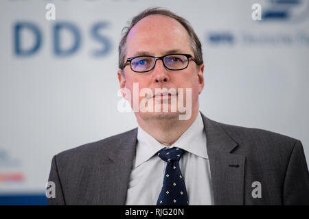 Manching, Germany. 06th Feb, 2019. Ralf Heidger, threat expert of the German Air Traffic Control (DFS), takes part in a discussion round on a presentation day of the German Armed Forces to track down and fend off drones. During a presentation day at the Manching airfield near Ingolstadt, it will be demonstrated how the flying objects can be detected, forced to an emergency landing with interference radiation or taken down from the sky with an interceptor drone. Credit: Matthias Balk/dpa/Alamy Live News Stock Photo