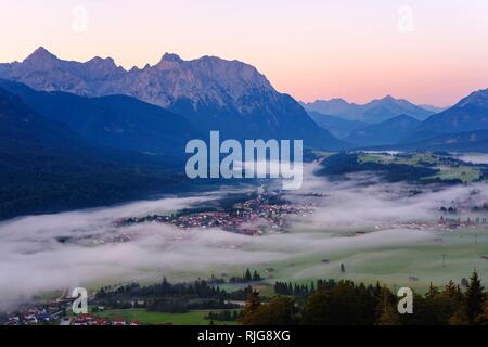 Krün and Isar with Karwendel Mountains, view into the valley with early fog from Krepelschrofen, Werdenfelser Land Stock Photo