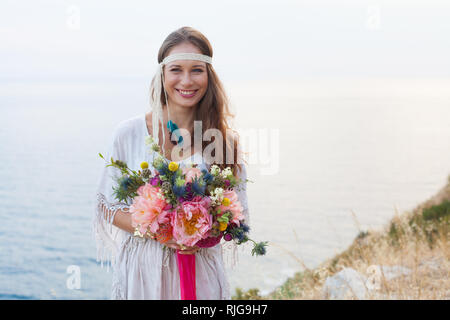 girl with a wedding bouquet boho style Stock Photo