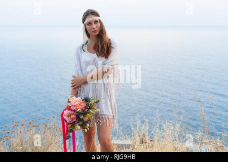 girl with a wedding bouquet boho style Stock Photo