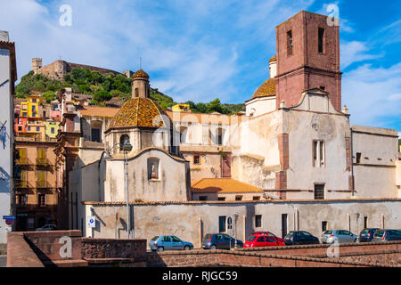 Bosa, Sardinia / Italy - 2018/08/13: Bosa Cathedral - Duomo di Bosa - at the Piazza Duomo square by the Temo river embankment with the Malaspina Castl Stock Photo