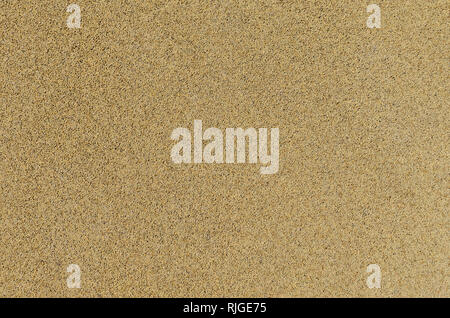 Yellow rubber covering for sports and playgrounds. Texture. Stock Photo