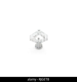 Plastic dowel for drywall isolated on white background.Corner of the dowel to up. Stock Photo