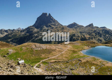 Pic du Midi Ossau mountain and Lake Gentau, Ayous lake hiking trail, in the Ossau Valley, Pyrenees-Atlantiques department (south-western France). Over Stock Photo