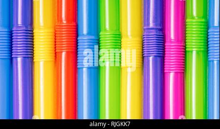 Macro shot of colorfull drinking straws in a row. Stock Photo