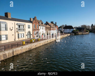 The Quay at the Old Riverport in the market town of St Ives Cambridgeshire UK on a sunny winter day Stock Photo