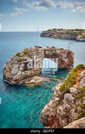 Es Pontas, a natural rock arch at Mallorca coast, Spain. Stock Photo