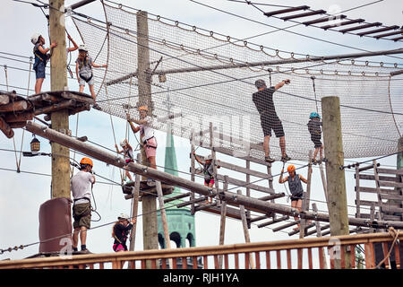 Montreal, Canada - June, 2018: Kids and adults walking on the canopy zipline in old port, Montreal, Quebec, Canada. Editorial. Stock Photo
