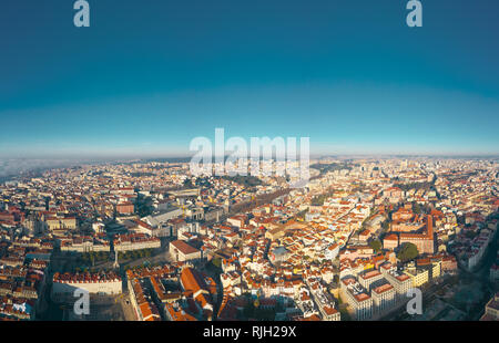 Panoramic view of Lisbon; old yellow rooftops in Portuguese capital Stock Photo