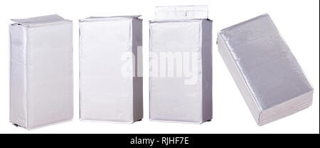 Packs with silver color foil pack with coffee. Mockup Blank Packaging For Coffee. Isolated on white background Stock Photo