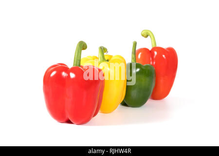 Red, yellow, green fresh and healthy peppers on white background Stock Photo