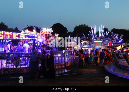 Fun fair in Gloucester Park, Gloucester, England, UK. The event is held annually in the city. August 2018 Stock Photo