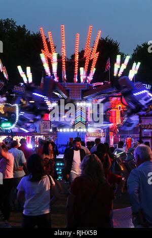 Fun fair in Gloucester Park, Gloucester, England, UK. The event is held annually in the city. August 2018 Stock Photo