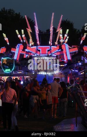 Fun fair in Gloucester Park, Gloucester, England, UK. The event is held annually in the city. August 2018 Stock Photo