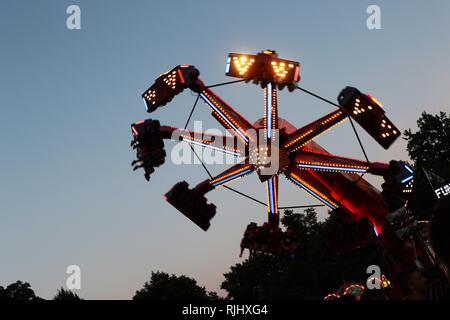 Fun fair in Gloucester Park, Gloucester, England, UK. The event is held annually in the city. August 2018 Stock Photo