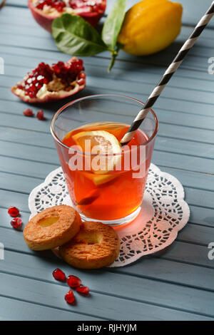 fresh pomegranate drink with lemon slice - closeup Stock Photo