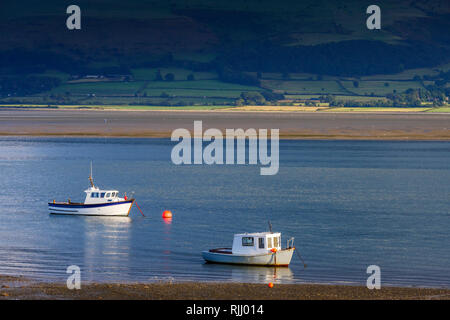 Boats moored on the Menai Strait Beaumaris Anglesey Gwynedd Wales Stock Photo