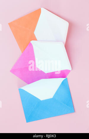 Colorful envelopes on pink  background Stock Photo