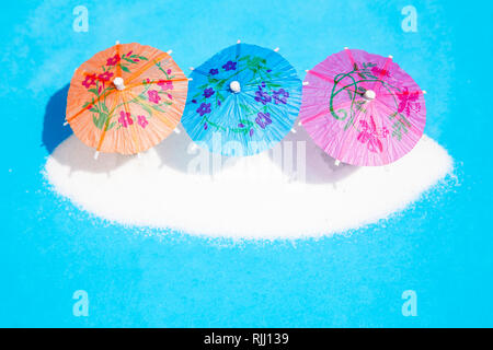 Colorful cocktail paper umbrellas Stock Photo