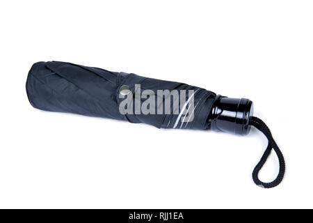 Black Folded Umbrella Isolated On White Stock Photo