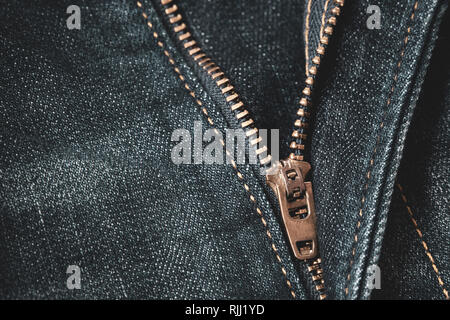 Close up of locking zipper on blue denim jeans. Stock Photo