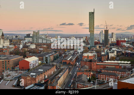 Manchester city centre skyline view across the rooftops from Salford  Beetham Tower, Liverpool Road, and MOSI Museum of Science and Industry site Stock Photo