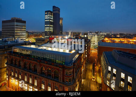 Manchester city centre skyline view across the rooftops from Hotel Indigo showing Federation House and the CIS tower, looking up to Shudehill Stock Photo