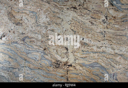 Natural stone beige granite with gray stripes, Golden cascade Stock Photo