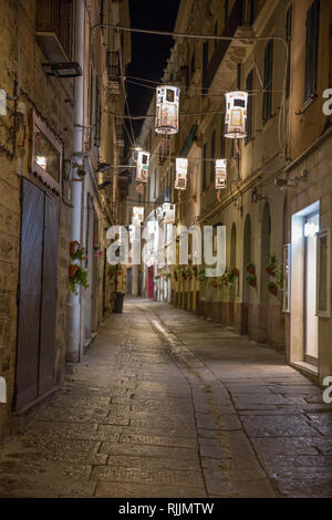 Street of old city of Alghero Stock Photo